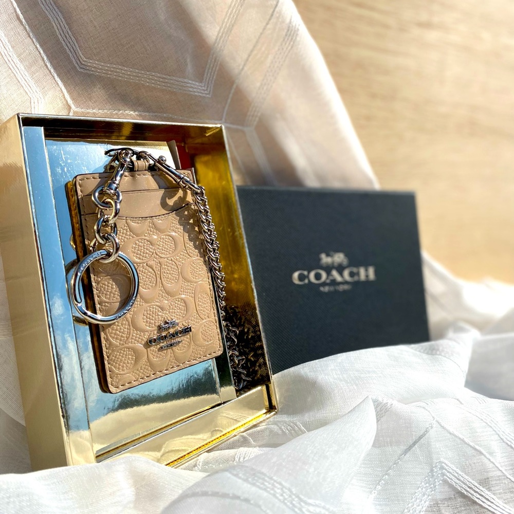 BRAND NEW Coach tan lanyard/ID holder/wallet.